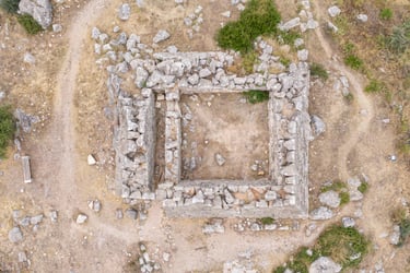Aerial view of the ancient stone ruins of the Pyramid of Hellinikon in Argos, Greece.
