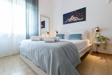 Casa Rava Sul Parco Camera da letto
