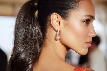 Sleek ponytail wedding guest hairstyle modern elegant