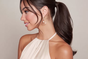 Sleek ponytail wedding guest hairstyle modern elegant