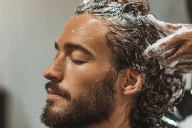 Washing hair Claudios Hair Salon