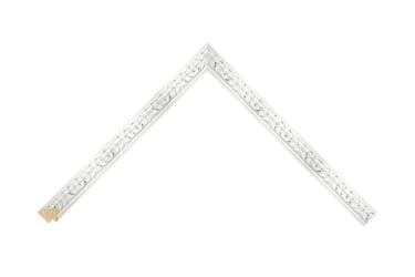 An ornate moulded white frame with distressed details.