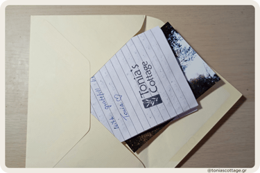 Letter in an envelope featuring a picture and a Tonia's Cottage stamp