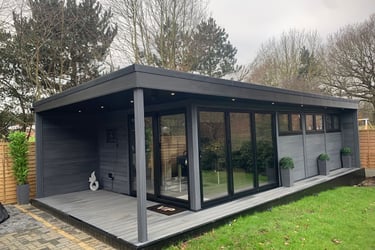 large composite garden room with canopy