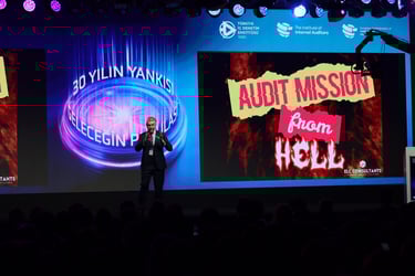 Andy Kovacs of ELC Consultants speaking on stage at audit conference about -Audit Mission from Hell