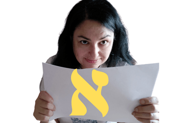 a woman holding a paper with a yellow x on it