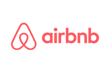 The pink Airbnb logo and wordmark centered on a solid black background.