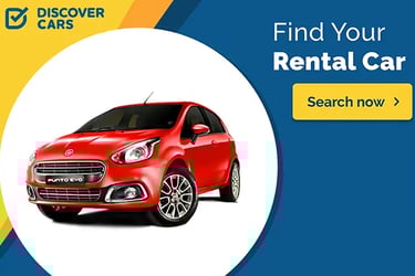 Red Fiat Punto Evo rental car advertisement by Discover Cars with a search now button.