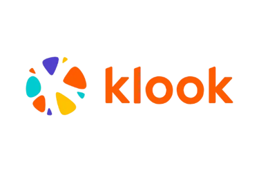 Official orange Klook travel logo and colorful abstract icon on a black background.