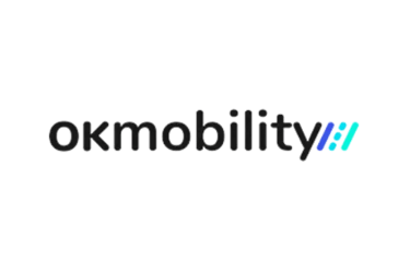 OK Mobility logo featuring dark grey lowercase text and a blue graphic on a black background.