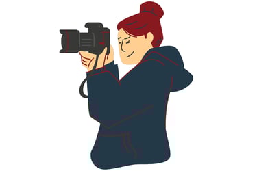 picto d'une photographe aux cheveux auburn