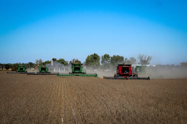 Photo of a farm with agricultural machinery