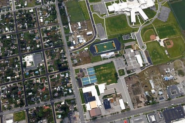Photographie aérienne pour illustrer l'impact de l'urbanisation sur la destruction des milieux