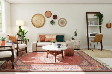 Eclectic boho living room with layered patterns, woven accents and a mix of colorful textiles.