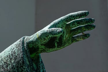 Close up on the hand of broether Julianus pointing eastward.