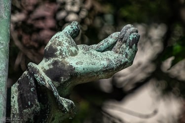 Close-up of Pope Innocent XI's raised hand in a gesture of blessing.