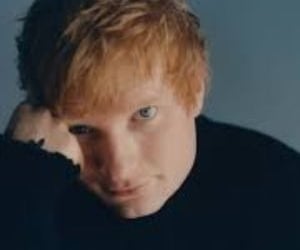 a man with a black shirt and a black shirt