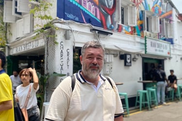 Image of Author: Jason A Ellis traveling the world, local area in Singapore