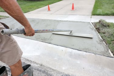 concrete contractor installing partial concrete driveway