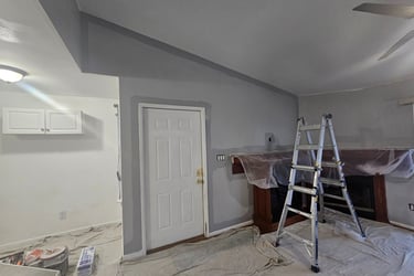 an interior room painted with a ladder