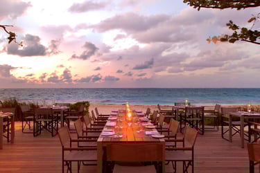 a restaurant with a view of the ocean