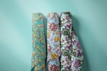 Three fabrics stacks featuring hand-drawn floral patterns