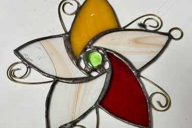 stained glass flower like a pinwheel