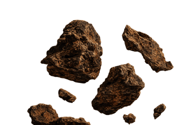 Textured brown volcanic rocks and floating stone fragments isolated on a solid black background.