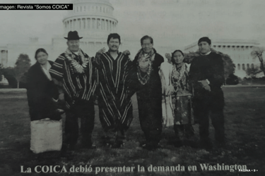 Indigenous leaders from COICA in traditional dress standing before the U.S. Capitol in Washington D.C.