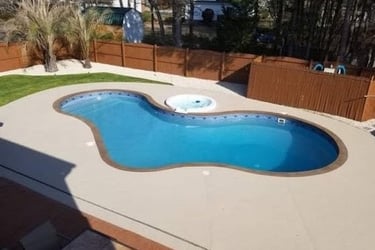a pool with a pool and a pool in the background