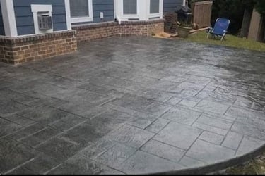 a patio with a patio with a concrete patio with a concrete patio with a concrete