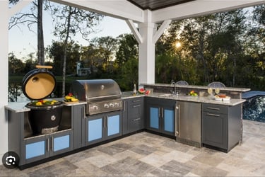 a kitchen with a grill and a grill