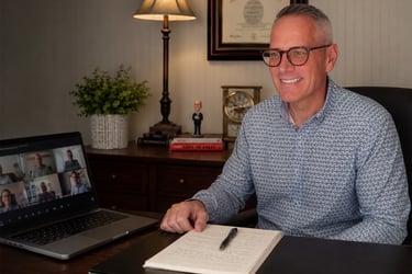 Doug working from his home office.
