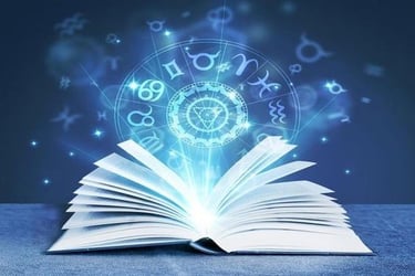 Livre ouvert d'où émerge un zodiaque sur fond de ciel bleu nuit