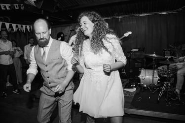 Bride and groom performing a dance for their guests.