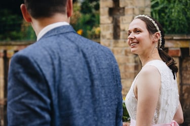 Bride staring into the eyes of the groom.