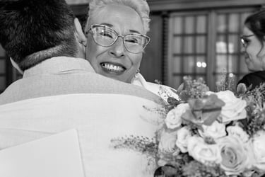 Guest congratulating bride with glasses..