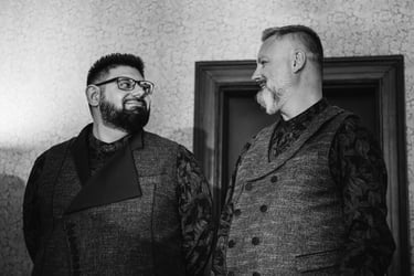 Grooms looking at each other during a wedding ceremony.