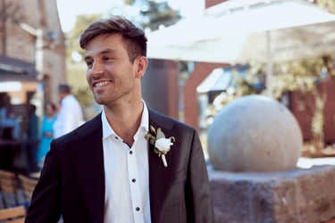 Portrait of a smiling groom.