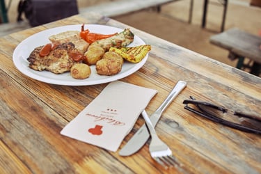 A plate of wedding food on a table.