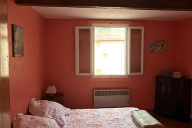 Bright double bedroom interior in Quillan holiday home