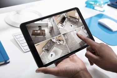a person holding a tablet with a camera and a tablet
