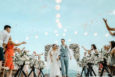 a bride and groom walking down the aisle of a wedding ceremony