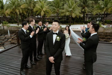 a groom and groomsmen are taking pictures of their wedding day