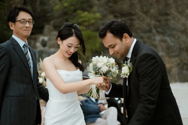 a man and woman getting married in a wedding ceremony