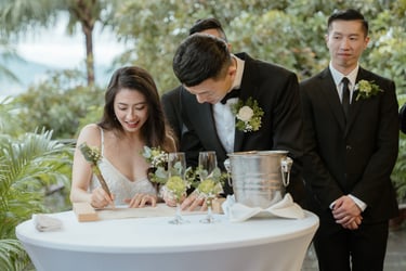a man and woman are standing in front of a table