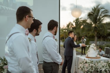 a man in a suit and tie is giving a toast toast
