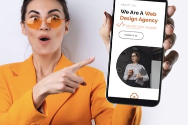 a woman in a suit and sunglasses holding a phone