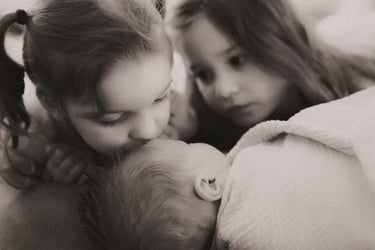 Sibling newborn photo with two sisters and baby brother, Duluth Minnesota