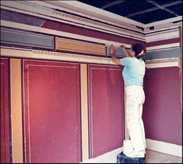 Christine Painting a Pompeii Mural